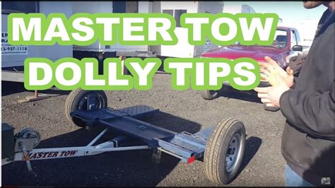 how to put on tow dolly straps